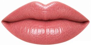 Close-up of lips wearing Pink Champagne LipSense in a soft peachy-rose pink shade