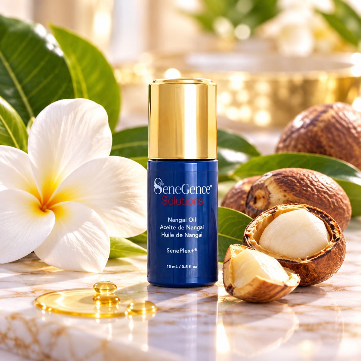 SeneGence Nangai Oil navy blue and gold bottle surrounded by tropical flowers and nangai nuts